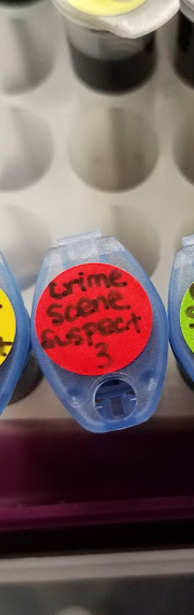 A vial saying "Crime Scene Suspect #3"