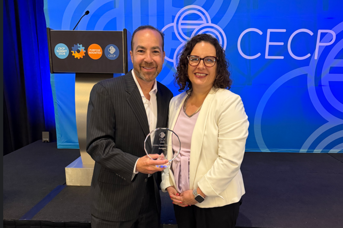 Scott Heimlich and Rebecca Lewis holding the CECP award for ABE