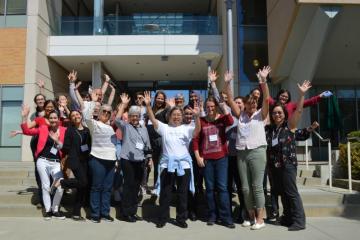 The group enjoying a tour of the Amgen production facilities